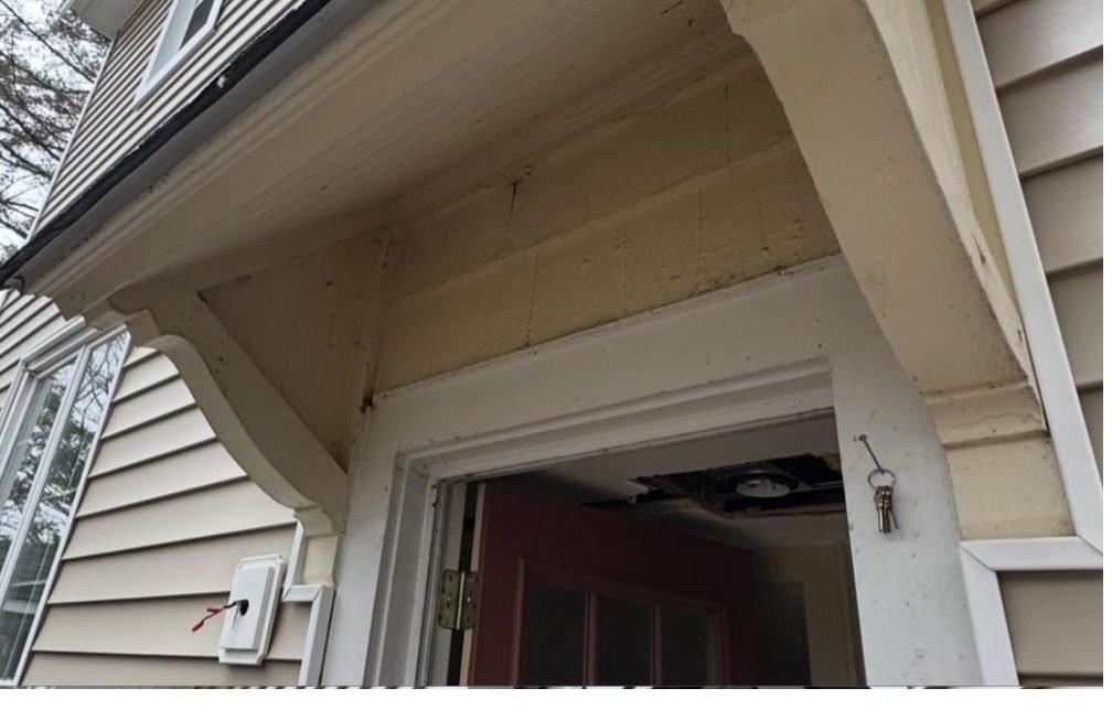 Before: entry overhang restoration